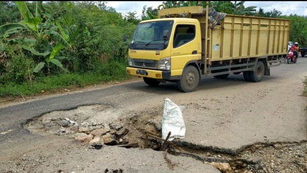 Kondisi ruas Jalan Lintas Provinsi (Jalinprov) Simpang Kumu-Kota Tengah /alfa Kondisi ruas Jalan Lintas Provinsi (Jalinprov) Simpang Kumu-Kota Tengah /alfa