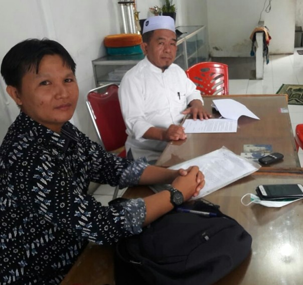 Abuzar, SH dari Kantor Hukum ASA MAKARIM & REKAN bersama Ketua PDM Pekanbaru, Syafrizal Syukur